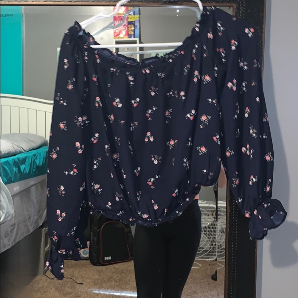 A floral blouse.